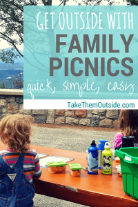 two girls eating lunch at a picnic table, text reads get outside with family picnics