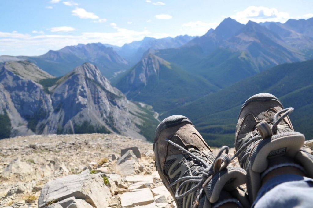 hiking shoes with the mountain view in the background