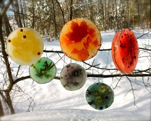 An easy winter craft are frozen ice sun catchers