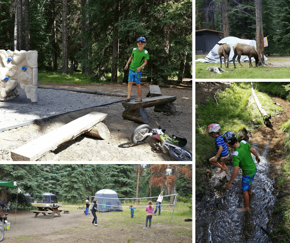 kids playing badminton, playing on wooden structures, and in a creek at Whistlers Campground in Jasper National Park