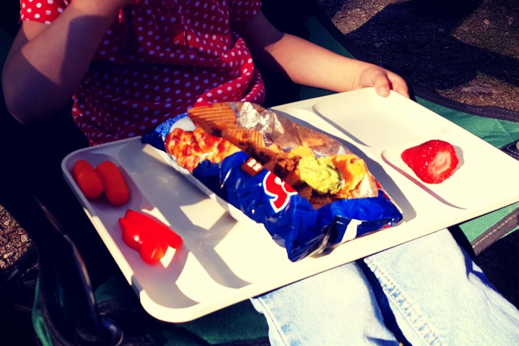 tacos in a bag sitting on a tray
