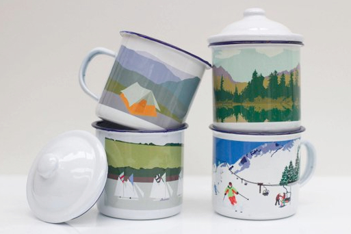 enamel mugs with scenes of outdoor activity printed on them