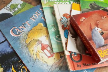 a stack of bear books for kids