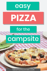 camping pizza on a picnic table at the campground