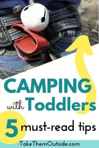 Toddler shoes with a bear bell attached to keep track of them at the campsite