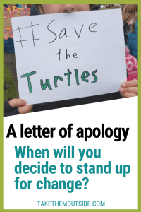 A child holding a climate protest sign which reads save the turtles