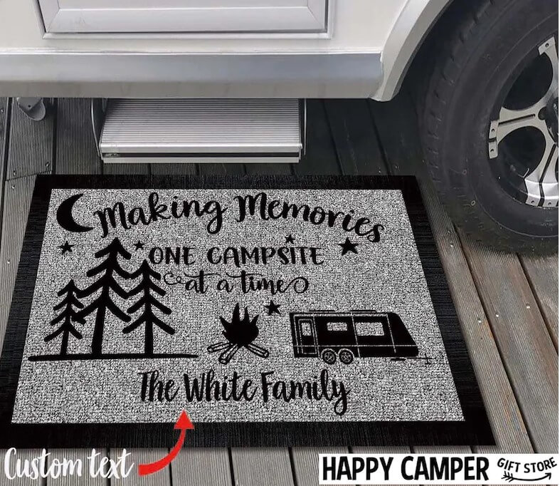 Custom made rubberized door mat with an image of a camper 
