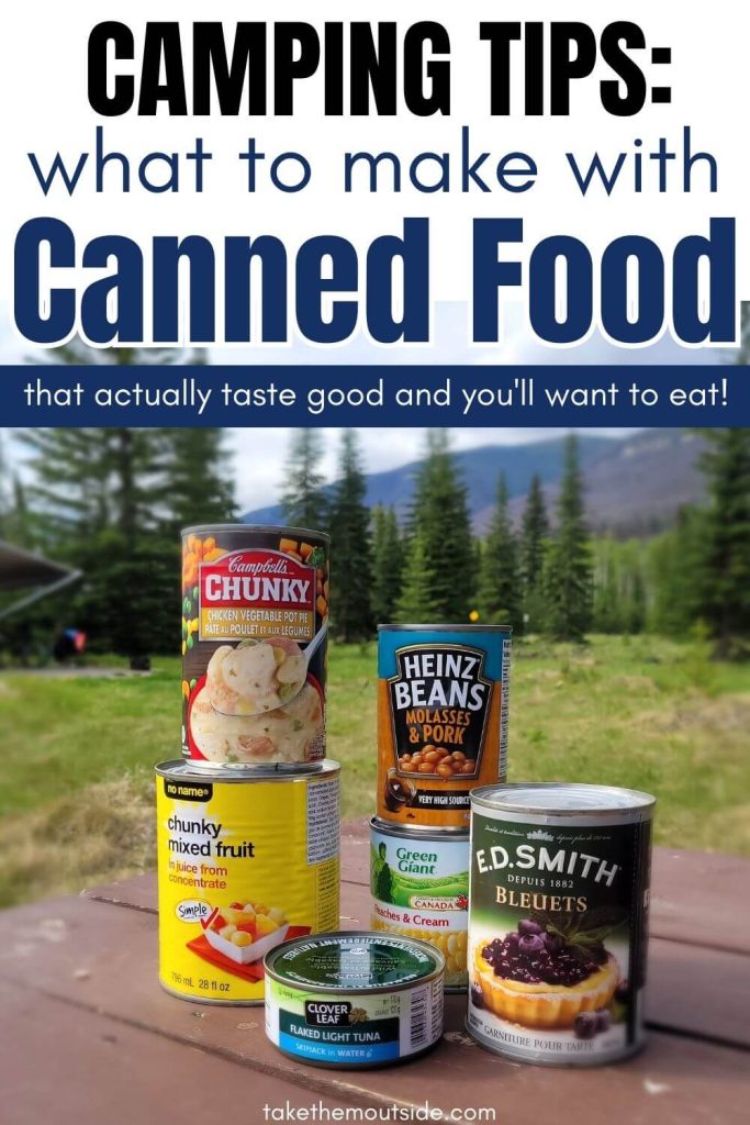 Canned foods on a picnic table at the campground